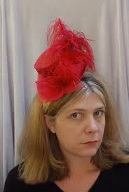 Don'[t look at me like that. I know this hat is awesome. It will be awesomer when I have the matching mini-cape to go with it. I'm still searching for it on E-Bay and random blogs.