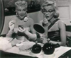 No, dear. It's not the hair or body or even the flawless features that got me where I am. It's the glasses. They make you smarter. It's like magic. 